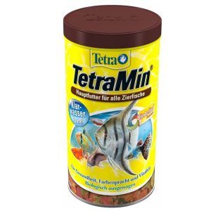 Hrana pesti acvariu TetraMin Flakes 100ml, hrana pesti fulgi premium pentru dieta completa si sanatatea pestilor, ideala pentru orice tip de acvariu. TetraMin Flakes 100ml este alegerea perfecta pentru pasionatii de acvaristica care doresc sa asigure o dieta echilibrata si sanatoasa pestilor lor ornamentali. Aceasta hrana pesti acvariu sub forma de fulgi este conceputa pentru toate tipurile de pesti tropicali si reprezinta o solutie de alimentatie completa, imbogatita cu nutrienti esentiali, vitamine si minerale pentru o crestere armonioasa si o viata indelungata a pestilor.