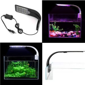 Lampa led acvariu plantat si pentru colorit pesti este o lampa cu lumina led acvariu si spectru compozit in 4 culori. Veioza acvariu pesti cu rezultate spectaculoase in dezvoltarea plantelor acvatice si accentuarea coloritului pestilor. Lampa led acvariu plantat si pentru colorit pesti care se preteaza pentru acvarii cu o lungime de pana in 40 cm. Efect instantaneu in amplificarea coloritului pestilor. Culoarea carcasei: negru. Material carcasa: ABS Aspectul produsului: acrilic Lungimea cabluluide alimentare: 90 cm. Pentru pesti mai colorati si acvarii mai frumoase. Pachetul include: 1 X Lampa LED pentru acvariu gata de a fi pusa in functiune. Iluminat intens la costuri mici. Intensitate iluminare: 1000 lumeni. Dotata cu leduri uimitor de luminoase de cea mai recenta generatie. Lampa acvariu ce economiseste energie electrica. Putere: 12W Tensiune alimentare: AC220-260V 50/60Hz Lampa este fabricata conform standardelor de rezistenta la umiditate IP54 Usor de instalat pe marguinea acvariului: pur si simplu clipati lampa pe geam. O lampa subtire, confectionata numai din materiale de cea mai buna calitate. Se monteaza extrem de simplu pe geamul acvariului. Sistemul de prindere permite montarea pe geam cu grosimea maxima de 6 mm. Buton de reglaj al modului de functionare al iluminarii pozitionat pe transformatorul electric. Modurile de iluminare: -la prima apăsare pe buton: se aprind toate cele 24 de leduri. -la o apăsare mai puternica pe buton: se sting toate ledurile indiferent de modul de iluminare Geamul din plastic transparent acrilic a ledurilor protejaza ledurile de stropii si vaporii de apa. Dimensiuni: 22 cm (Lungime) x 6,8 cm (latime) x 0,7 cm (grosime).