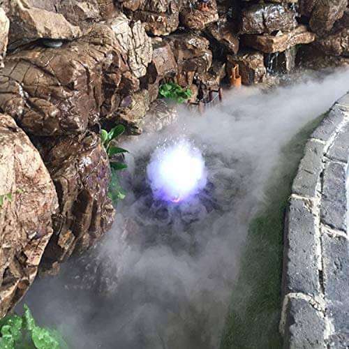Generator de ceata cu 12 leduri 12 Generator de ceata cu 12 leduri este un Mist Maker ce simuleaza nori mici si ceata racoroasa. Generator de ceata cu ultrasunete, aparat ceata rece ce functioneaza in orice vas de apa (castroane de apa, cascade, etc), cu o adancime de minim 5 cm! Generator de ceata ce ridica deasupra apei nori de ceata si totodata creeaza un spectacol de lumini in apa – Genereaza o ceata racoroasa. Ideal pentru cresterea nivelului de umiditate si crearea unui mediu cetos natural si umed. Impreuna cu aceasta tehnologie, iluminarea cu leduri creaza o ambianta aparte. Functioneaza in orice vas de apa (castroane de apa, cascade, etc), cu o adancime de minim 5 cm! Sistemul de siguranta a dispozitivului nu permite functionarea acestuia (dispozitivul se opreste automat) in cazul in care nivelul apei scade sub 5 mm deasupra senzorului. • Aparat ceata rece ce creste nivelul de umiditate a aerului de pana la 100%. • Efect vizual deosebit. • Simuleaza nori mici si ceata in terarii tropicale. • Genereaza roua dimineata in terariile desertice. • Ledurile au capacitatea de a-si schimba automat culorile dand nastere unui spectacol unic in combinatie cu ceata generata. Generatorul de ceata ultrasonic este un dispozitiv sigur, eficient si numai cu efecte benefice pentru crearea unui mediu cat mai aproape de conditiile naturale in care traiesc reptilele. Acest generator de ceata cu ultrasunete poate fi folosit de asemenea in orice incapere ca umidificator sau in scop pur si simplu decorativ. Dispozitivul utilizeaza cca 80ml apa/ora, la o temperatura de lucru de temperatura de lucru 5 °C – 40 °C. Silentios: difuzorul de ceata prin tehnologia ultrasonica silentioasa iti va respecta linistea. Specialitatea lui este de a creea o atmosfera relaxanta. Dimensiuni – 38 mm inaltime x 44 mm diametru